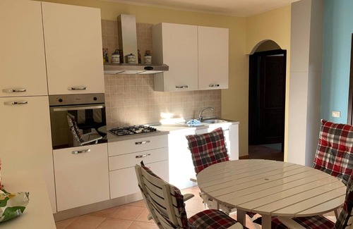Monte Petrosu Casa | Apartment 'Prestige Exclusive' with Shared Pool, Wi-Fi and Air Conditioning