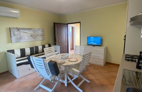 Monte Petrosu Casa | Apartment 'Prestige Exclusive' with Shared Pool, Wi-Fi and Air Conditioning