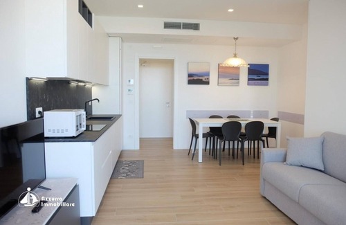 Jesolo Apartamento | Apartamento 'Residence Bafjle 42' con piscina compartida, terraza privada y aire acondicionado.