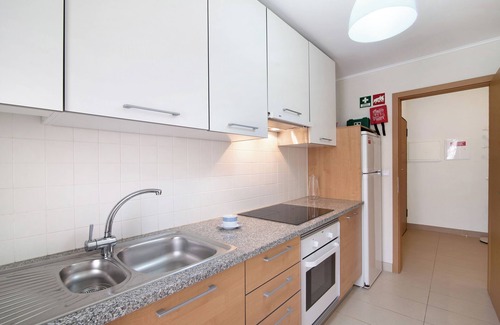 Canada Apartamento | Apartamento 'Royal Cabanas Golf 88' con piscina compartida, jardín compartido y aire acondicionado.