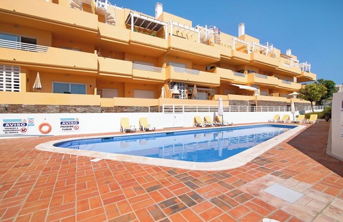 Canada Apartamento | Apartamento 'Royal Cabanas Golf 88' con piscina compartida, jardín compartido y aire acondicionado.