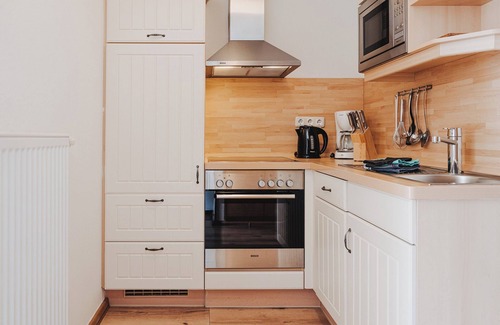 Baltrum Apartamento | Apartamento 'Shenandoah' con balcón propio, jardín compartido y Wi-Fi
