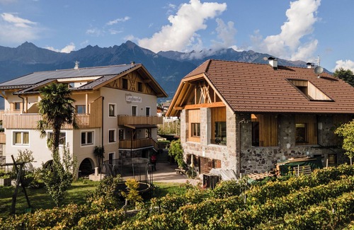 Merano Apartamento | Apartamento 'Torgglbauer 1' con vistas a la montaña, piscina, terraza y Wi-Fi