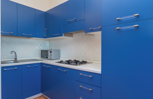 Porto Ottiolu Apartamento | Apartamento 'Villetta Porto Ottiolu 203" Cerca del puerto deportivo y de la playa con balcón