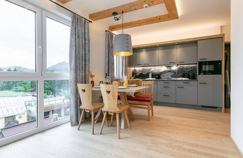 Haus im Ennstal Apartamento | Apartment with a private sauna and a balcony