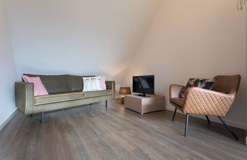 Oostkapelle Apartamento | Apartment with balcony on the sunny side, close to nature and beach.
