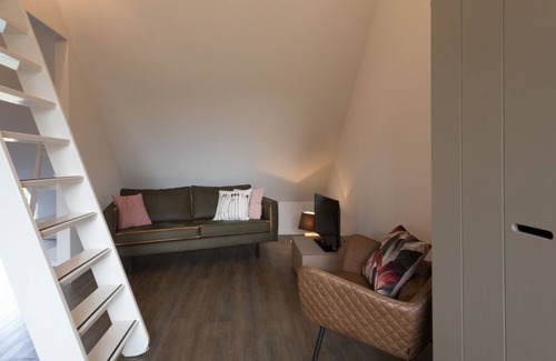 Oostkapelle Apartamento | Apartment with balcony on the sunny side, close to nature and beach.