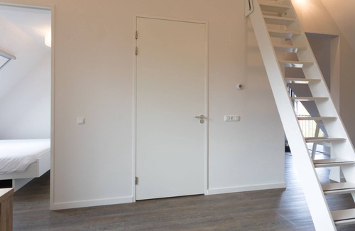 Oostkapelle Apartamento | Apartment with balcony on the sunny side, close to nature and beach.