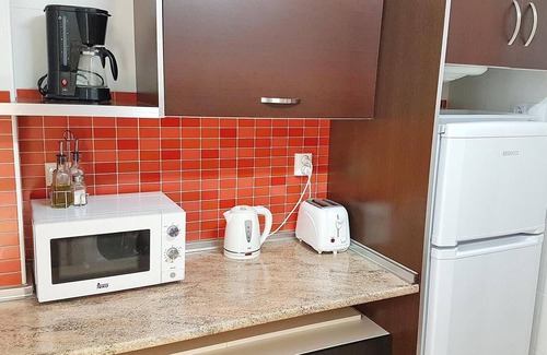Orihuela Costa Apartamento | Apartamento con gran solarium en la azotea, Piscina, Jardín, Barbacoa, A/C y Wi-Fi