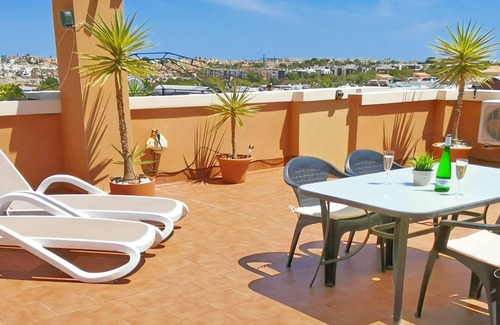 Orihuela Costa Apartamento | Apartamento con gran solarium en la azotea, Piscina, Jardín, Barbacoa, A/C y Wi-Fi