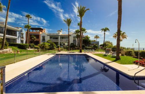 Bahia de Casares Apartamento | Apartment, with private terrace and in beachfront urbanization with heated pool, in Casares Costa