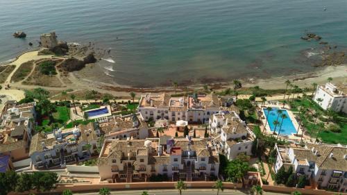 Bahia de Casares Apartamento | Apartment, with private terrace and in beachfront urbanization with heated pool, in Casares Costa