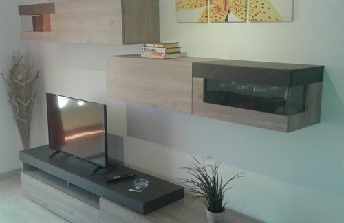Playa Paraiso Apartamento | Apartamento con piscina y vistas al mar.
