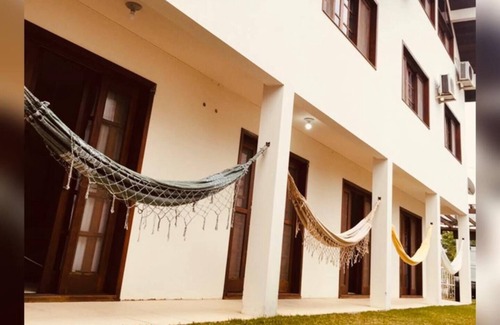 Barra de Ibiraquera Apartamento | Departamento con dos suites a dos cuadras del mar y tres cuadras de la laguna