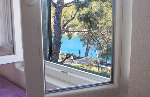 Cove Osibova (Milna) Apartamento | Apartamentos Brac Osibova - Apartamento de 1 dormitorio con patio y vistas al mar (A2) - (ST)