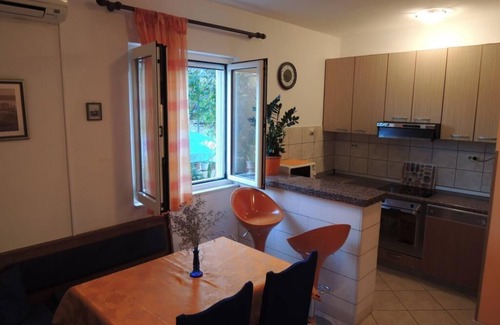 Mirce Apartamento | Apartments Guerieri - Apartamento de dos habitaciones con terraza y vistas al jardín (A1)