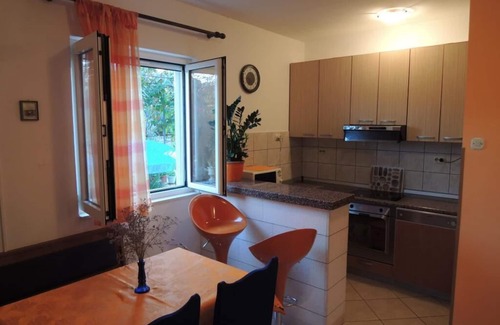 Mirce Apartamento | Apartments Guerieri - Apartamento de dos habitaciones con terraza y vistas al jardín (A1)