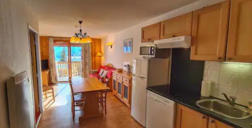 Orcieres-Merlette Apartamento | Appart chaleureux au pied des pistes avec piscine