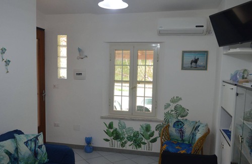 S'Archittu Apartamento | Holiday apartment in a small condominium 300 meters from the sea shore with sea view from the bedroo