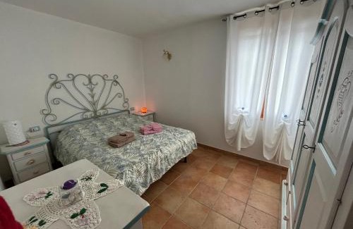 Torre del Pozzo Apartamento | Appartamento in villa con vista mare