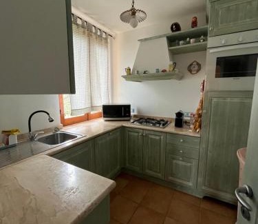 Torre del Pozzo Apartamento | Appartamento in villa con vista mare