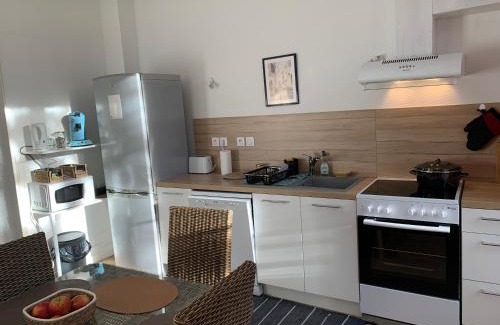Loures-Barousse Apartamento | Appartement avec jardin