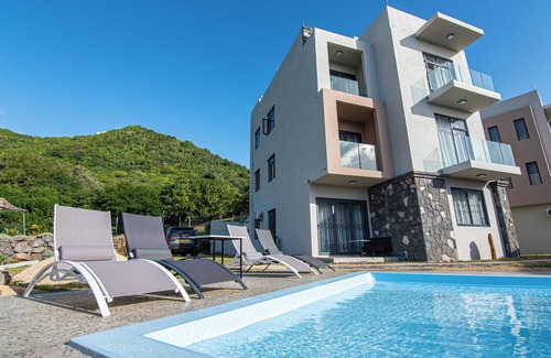Black River Apartamento | Appartement avec splendide vue sur lile aux Benitiers et Le Morne Brabant