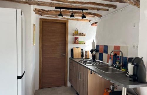 Polopos Apartamento | Appartement met airco en dakterras met zicht op zee en bergen