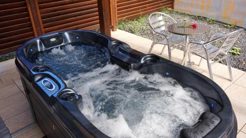 Cafeiere Apartamento | Appartement romantique à Deshaies - 46 m² - spa et piscine