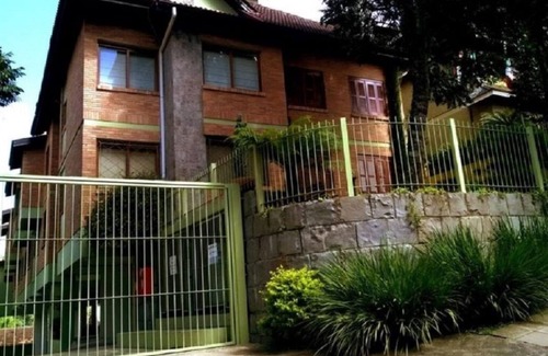 Gramado Apartamento | Apto en el corazón del centro de Césped acogedor con calefacción, WIFI y NETFLIX.