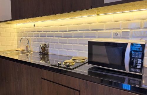 Jakarta Apartamento | Apt Sudirman Suite 3BR With Infinity Pool & Netflix by Damaresa