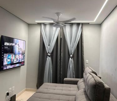 Real Apartamento | APTO BEIRA MAR - ACONCHEGANTE VARANDA GOURMET - WIFI - NETFLIX - TV A CABO - PRAIA GRANDE