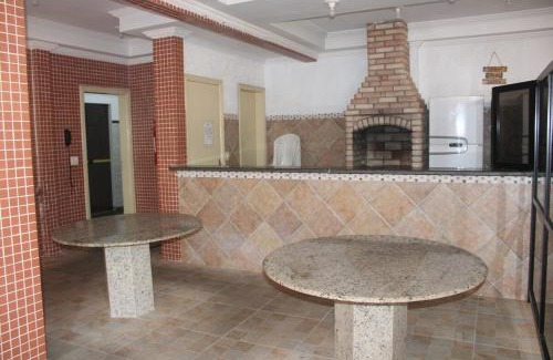 Guilhermina Apartamento | Apto Beiramar com piscina em Praia Grande