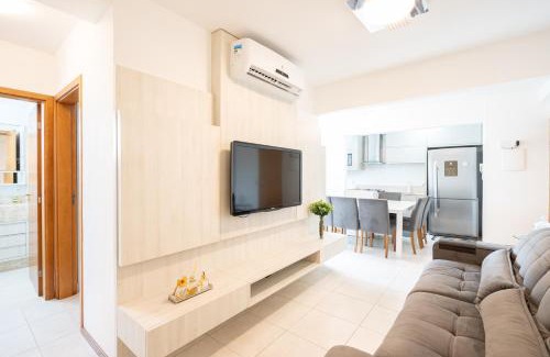 Barra Velha Apartamento | Apto em Barra Velha 340m da PRAIA com SACADA com CHURRASQUEIRA, AR CONDICIONADO WI-FI, PISCINA, PORTARIA 24h, ACADEMIA MINI MERCADO e vaga de GARAGEM