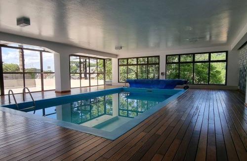 Floresta Apartamento | Apto no centro de Gramado com piscina aquecida