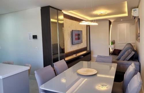 Bombas Apartamento | Apto novo 2 suítes, alto padrão, familiar, piscina aquecida no condomínio, 1 quadra mar