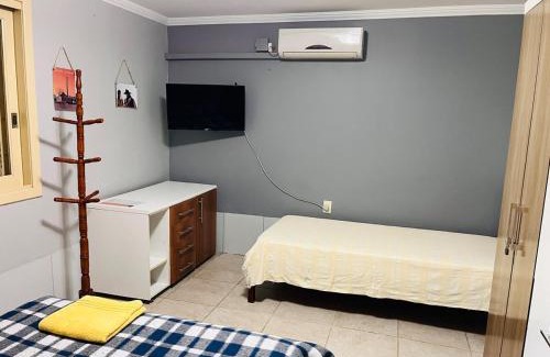Nonoai Casa | Apzito Tri com garagem