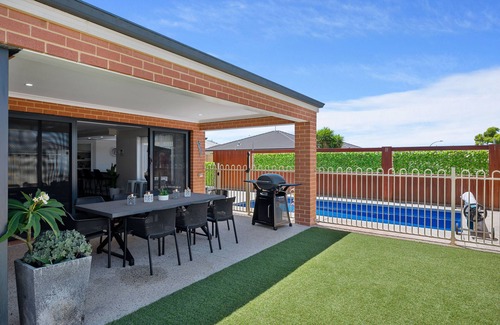 Halls Head Casa | Arcadia Retreat - 4-bed, 2.5 bath oasis with pool, theatre, and arcade machine!
