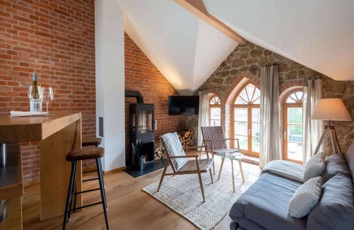 Buhlau Apartamento | Pisodevacacionescon bañera de hidromasaje y sauna.
