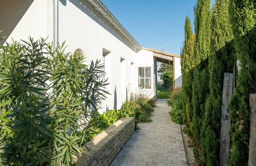Loix Casa | Architect house mansion with heated pool in quiet Loix
