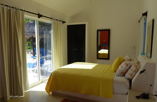 Akumal Villa | Architecturally Distinguished Colorful Casa on Water's Edge