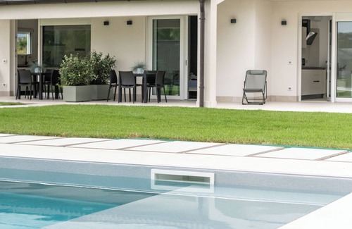 Borgo Milano Apartamento | Armonia Suites Terra, new apartment with garden and pool in Verona