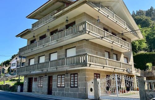Poio Casa | As Adegas