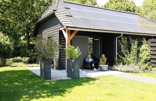 Wilbertoord Apartamento | Atmospheric luxury holiday home – spacious garden – 5 minutes from the forest.