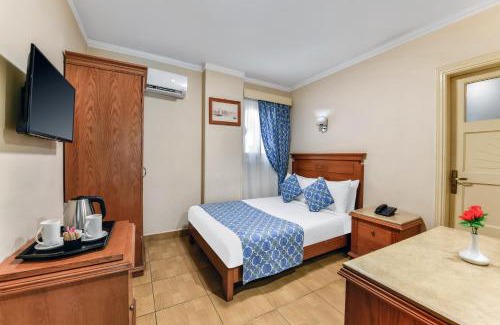 Shurtah al-Dakhlah Hotel | Aura Inn Tiba Pyramids Hotel
