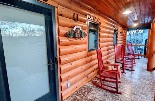 Albert Lea Casa | Happy Days Log Home and garden on Fountain Lake. Toys for all!