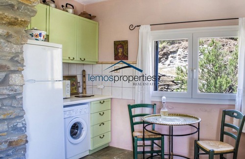 Ioulida Casa | Auténtica granja de piedra con vistas al mar en una parcela de 5.000 metros cuadrados