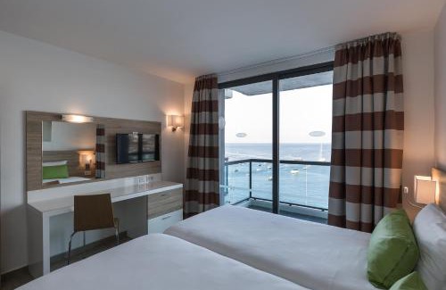 Qawra Hotel | AX ODYCY Hotel
