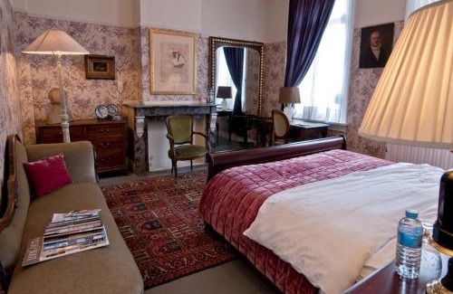 Statiekwartier Cama Y Desayuno | B&B The Baron