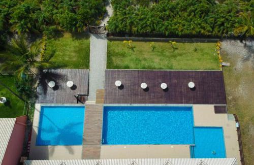 Aritagua Apartamento | B17 - Condomínio Praia da Pérola - Rodovia Ilhéus x Itacaré BA